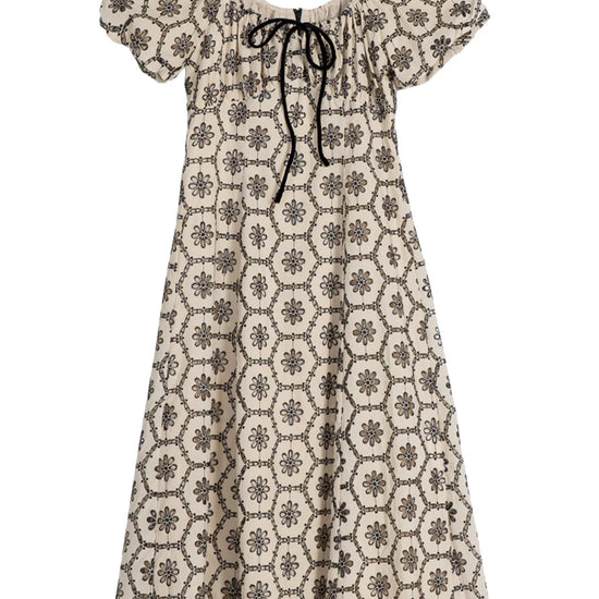 Long dress with floral pattern on a white background