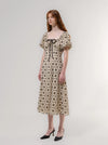 Woman wearing a floral dress on a white background