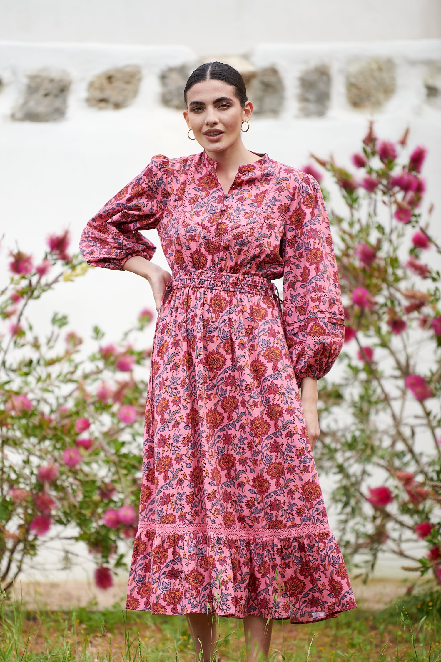 Pink midi dress with floral details with bracelet length sleeves mau collar covered button half placket elasticated waist with drawstring and gathered hem with lace inserts