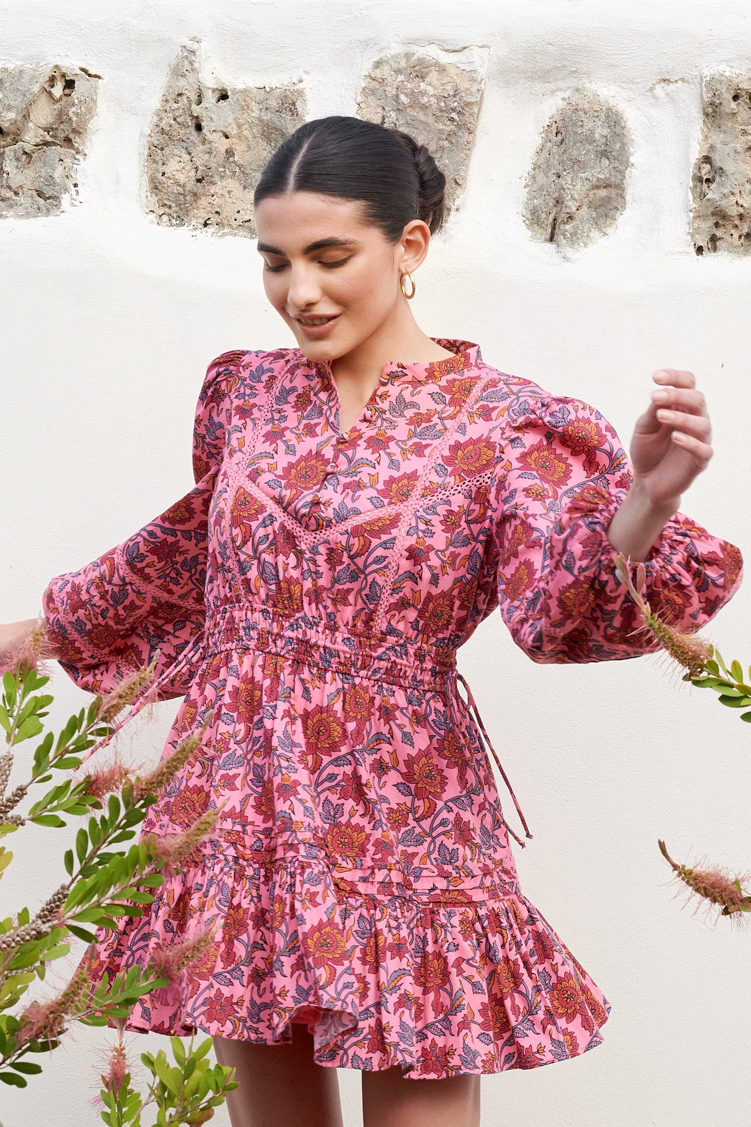 Pink floral short dress with elasticated and drastring waist with mau collar and balloon sleeves with ruffle skirt