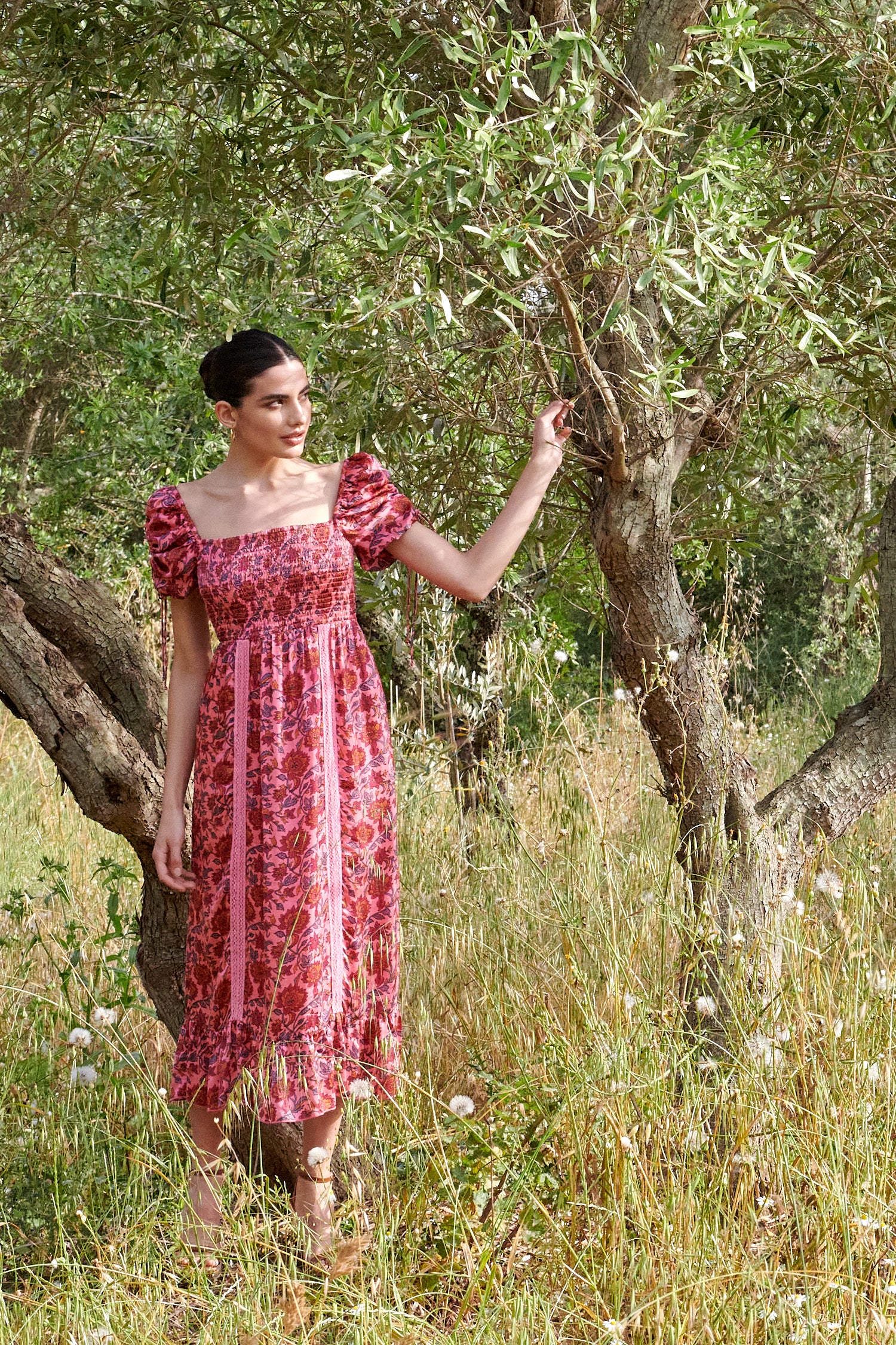 Pink midi dress with all over floral pattern square neckline and puff sleeves with elasticated cuffs and drawstring details