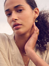 gold rising sun charm huggie earrings with diamante detailing from rachel jackson model shot