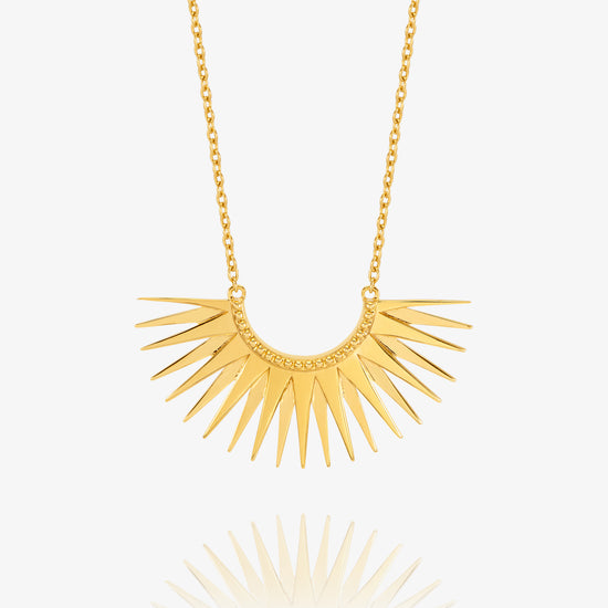 medium sized half sunshine with gold spikes on a delicate gold chain from rachel jackson
