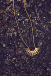 medium sized half sunshine with gold spikes on a delicate gold chain from rachel jackson 