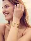gold half sunshine ring with spikes from rachel jackson model shot