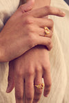 gold half sunshine ring with spikes from rachel jackson model shot