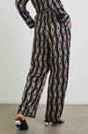 silky black wide leg drawstring trousers with gold link pattern rear view 