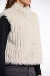 light beige faux fur sleeveless gilet with high neck, central closure and stripe detailing side view 