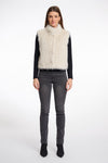 light beige faux fur sleeveless gilet with high neck, central closure and stripe detailing model shot