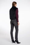 black faux fur sleeveless gilet with high neck, central closure and stripe detailing rear view 