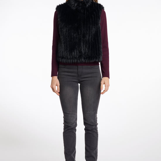 black faux fur sleeveless gilet with high neck, central closure and stripe detailing model shot