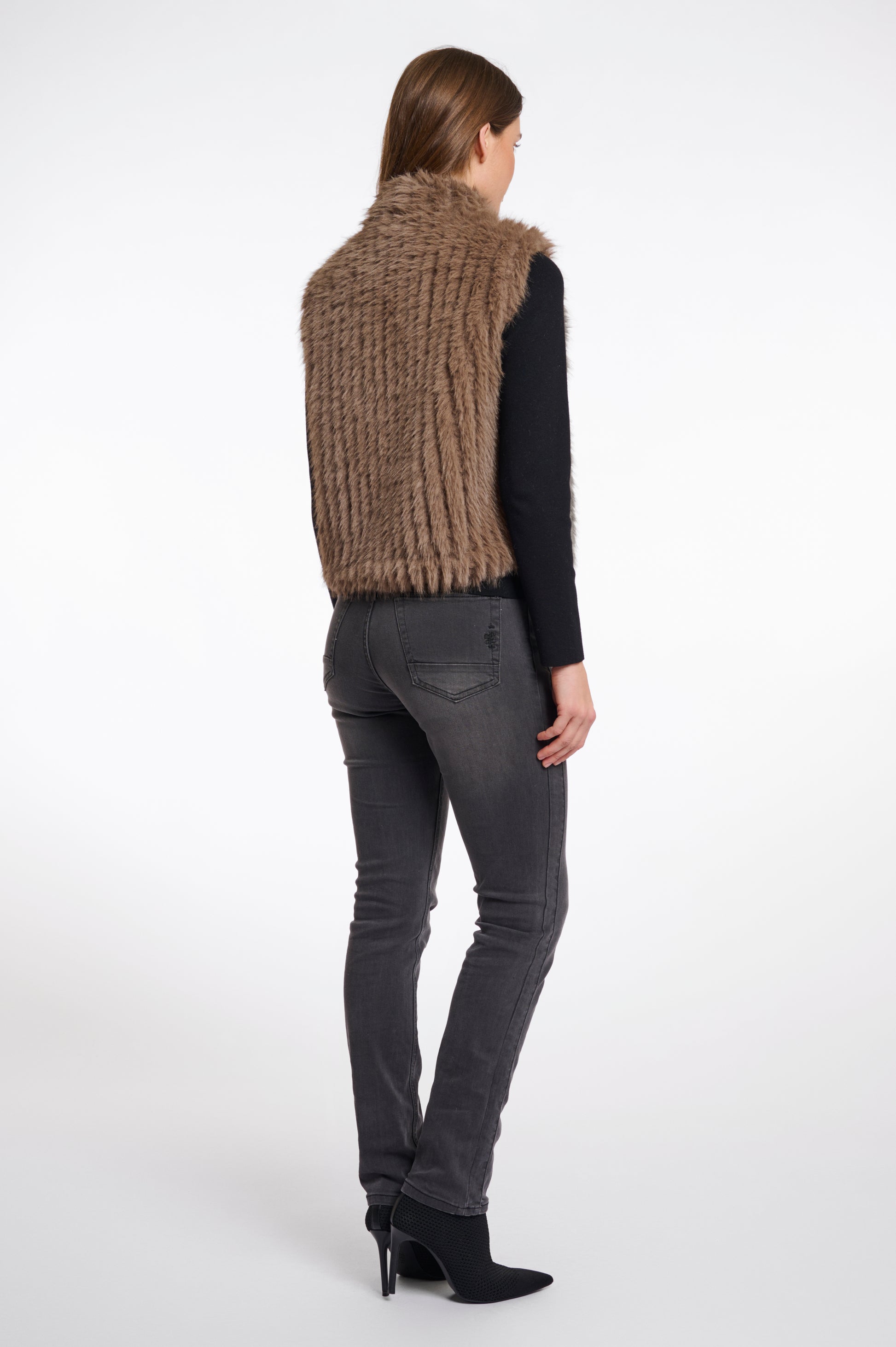 brown faux fur gilet with high round neck and stripe detailing with central closure rear view