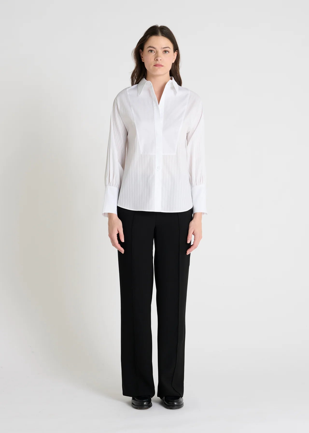 white classic shirt with concealed placket, curved hem and stitch detailing model shot