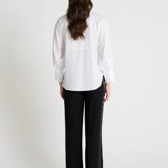 white classic shirt with concealed placket, curved hem and stitch detailing rear view