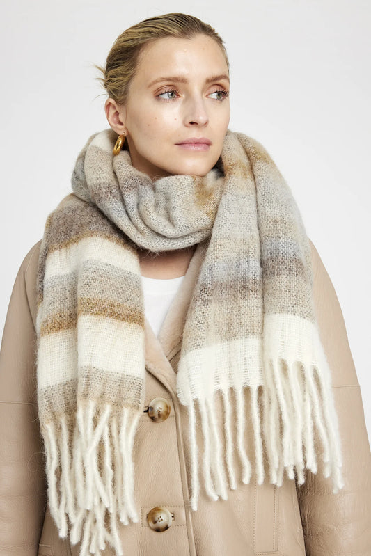 beige, brown and white striped wool scarf with tassels model shot