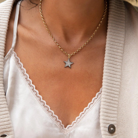 Diamond studded chunky star necklace on a gold chain