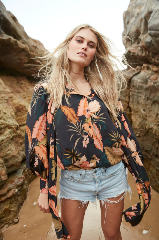 silk pussybow teal blouse with botanical colourful print from tabitha webb model shot