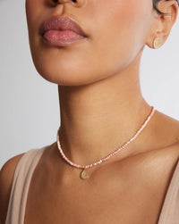 Pink opal beaded necklace with gold plated teardrop pendant and lobster clasp