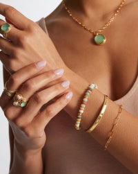 Amazonite braceelet worn with hammered cuff and chain bracelet