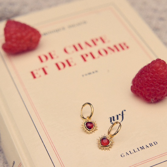 gold spiky heart shaped charm earrings with red stone and huggie hoops from rachel jackson 