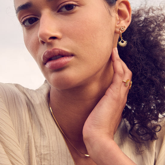 sunshine stud gold earring with butterfly fastening from rachel jackson model shot