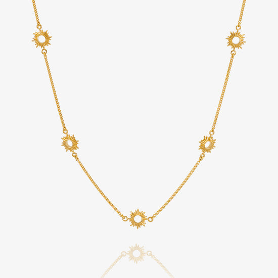 gold necklace with sunshines along the chain from rachel jackson