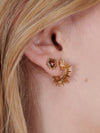 small spiky gold heart stud earrings with red stone inside and butterfly clasp from rachel jackson model shot