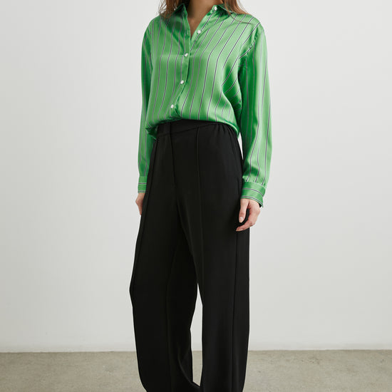 Elias Shirt Basil Stripe shown tucked in trousers and shoes