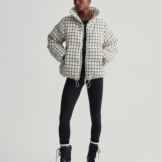 mono check short puffer with high neck and side pockets model shot