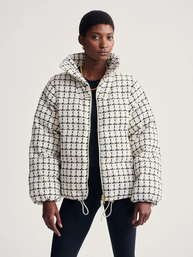 mono check short puffer with high neck and side pockets model shot