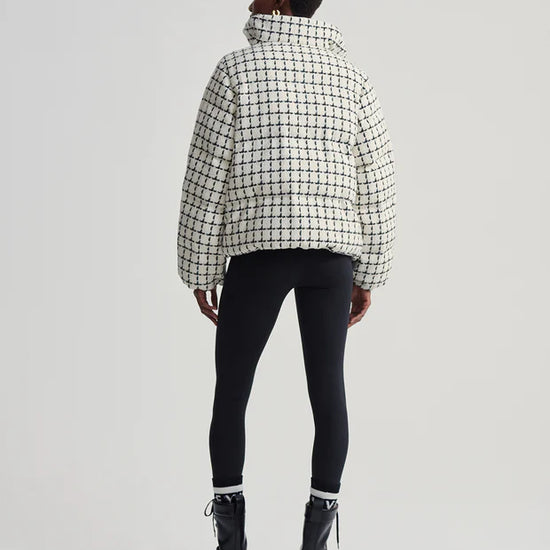 mono check short puffer with high neck and side pockets  rear view