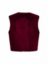 A sleeveless, cropped faux fur vest in deep burgundy, shown flat against a solid white background.