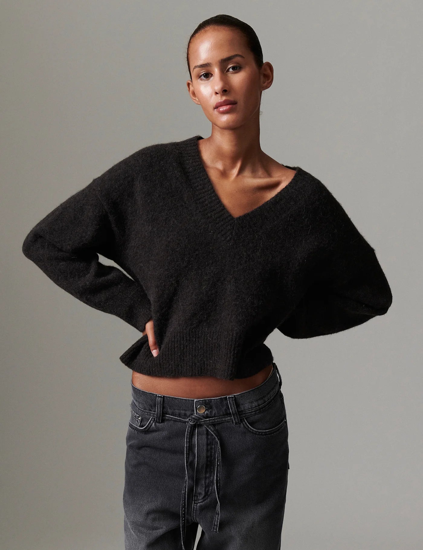 v neck jumper dark brown wool jumper with rib detailing and oversized fit