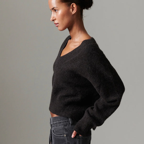 v neck jumper dark brown wool jumper with rib detailing and oversized fit side view