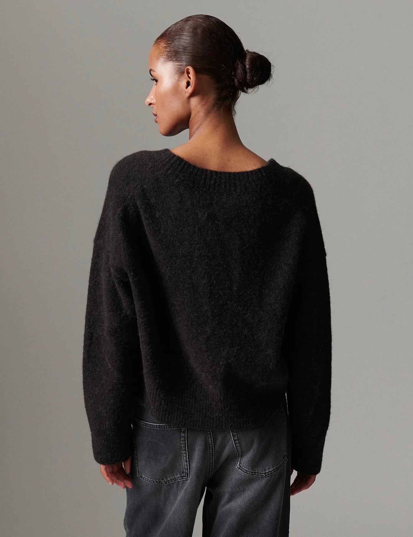 v neck jumper dark brown wool jumper with rib detailing and oversized fit rear view