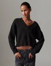 v neck jumper dark brown wool jumper with rib detailing and oversized fit model shot
