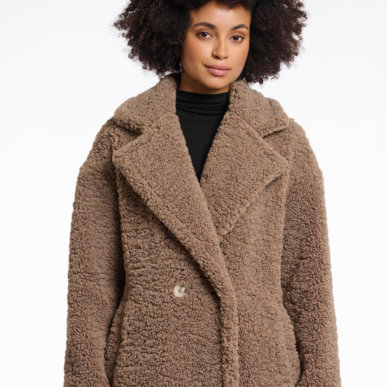 brown teddy bear fur mid length coat with single button closure and collar/lapel close up