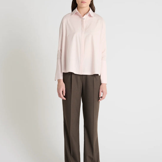 light pink shirt with concealed placket  and uniques collar model shot