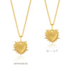 gold spiky heart with red stone inside on a gold chain from rachel jackson flip side