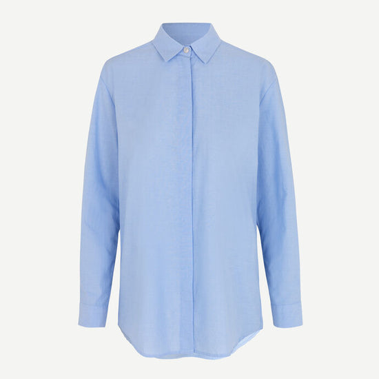 Light blue cotton shirt with long sleeves and full length hidden placket with button fastening