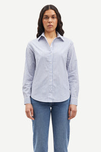 Regular fit blue and white striped shirt with classic collar and long sleeves with dipped curved hem