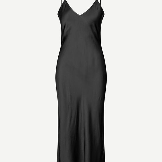 Black slip dress with adjustable straps and V neck and backline