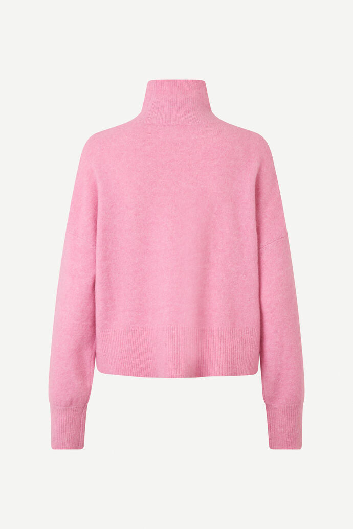 pink turtleneck jumper