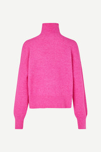 Pink turtleneck jumper