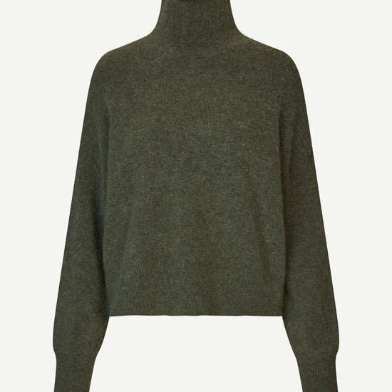 dark green turtle neck jumper