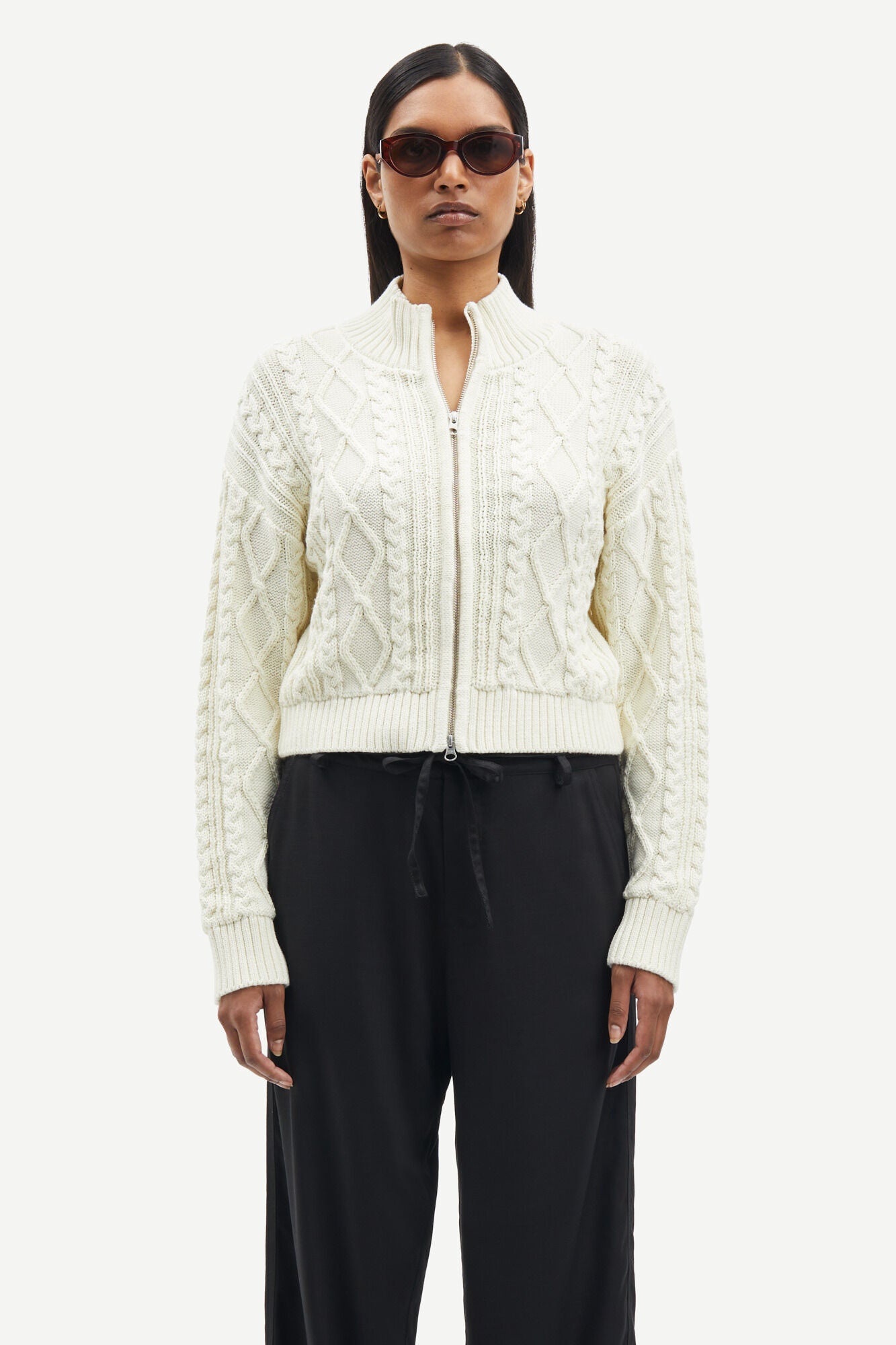 Chunky cream cardigan with two way zip and turtleneck with arron styling and cropped length