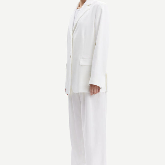 Ecru linen look pleated front trousers with side pockets