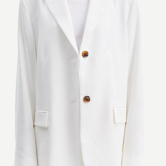 White blazer with tortuous shell buttons 