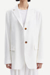 White blazer with tortuous shell buttons 