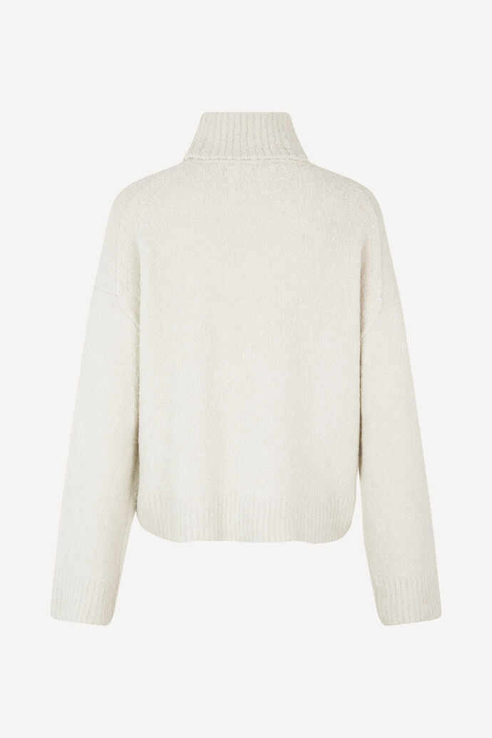 Spongey knitted winter white turtleneck jumper with dropped shoudlers